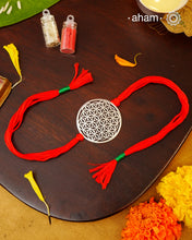 Beautiful Silver Rakhi
Make this Rakshabandhan Memorable with this handcrafted Rakhi Silver dial weaved with cotton thread for an ever-lasting Knot.Roli and Akshat (kumkum chawal) shipped along with India orders only