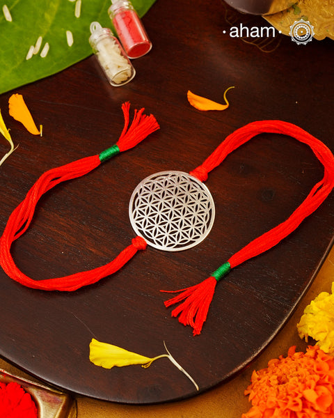 Beautiful Silver Rakhi
Make this Rakshabandhan Memorable with this handcrafted Rakhi Silver dial weaved with cotton thread for an ever-lasting Knot.Roli and Akshat (kumkum chawal) shipped along with India orders only