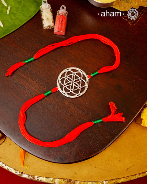 Beautiful Flower Rakhi crafted in 92.5 silver.Make this Rakshabandhan Memorable with this handcrafted Rakhi for an ever-lasting Knot.Tip: you can later convert this into a key chain charm or a pendant as well