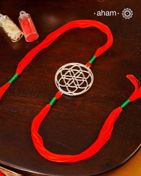 Beautiful Flower Rakhi crafted in 92.5 silver.Make this Rakshabandhan Memorable with this handcrafted Rakhi for an ever-lasting Knot.Tip: you can later convert this into a key chain charm or a pendant as well