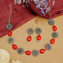 Handcrafted 92.5 sterling silver neckpiece and earrings set. Pendant with intricate amulet, floral coral stone setting, double peacock motif and cultured pearls.