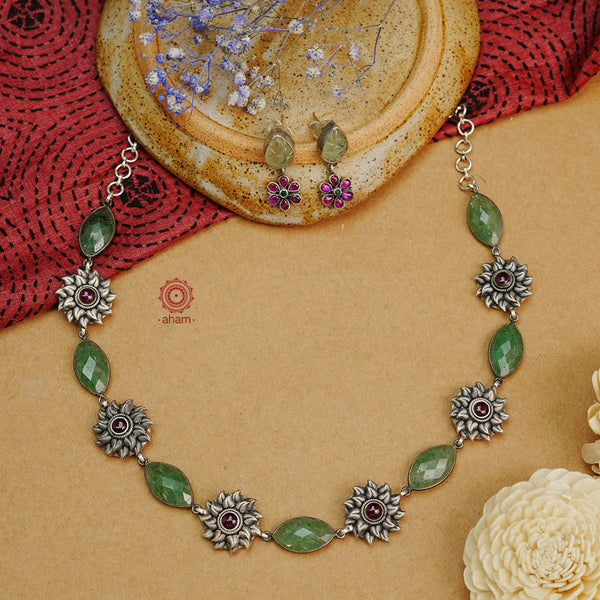 Handcrafted 92.5 sterling silver neckpiece and earrings set. Pendant with intricate amulet, floral stone setting, double peacock motif and cultured pearls.
