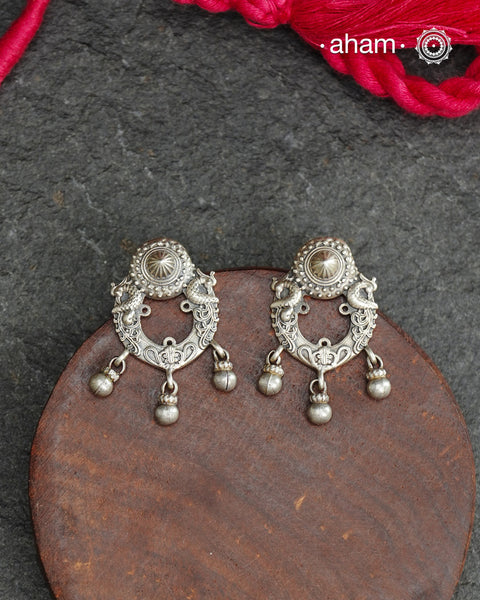 The Mewad Silver Neckpiece &amp; Earrings Set showcases expertly crafted silver paired with delicate ghungroos, designed to complement professional attire effortlessly. This lightweight and elegant set brings a refined cultural touch to your workwear, ensuring comfort and sophisticated style throughout your busy day.