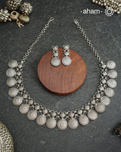 Elevate your collection with this exquisite Mewad Silver Neckpiece &amp; Earrings Set, meticulously crafted from premium 92.5 sterling silver. Each piece showcases intricate detailing while remaining remarkably lightweight. The coordinated set offers versatile styling options, seamlessly transitioning from everyday elegance to special occasions. Whether you're curating your personal wardrobe or seeking a thoughtful gift for someone discerning, 