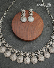 Elevate your collection with this exquisite Mewad Silver Neckpiece &amp; Earrings Set, meticulously crafted from premium 92.5 sterling silver. Each piece showcases intricate detailing while remaining remarkably lightweight. The coordinated set offers versatile styling options, seamlessly transitioning from everyday elegance to special occasions. Whether you're curating your personal wardrobe or seeking a thoughtful gift for someone discerning,