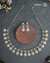 Elevate your collection with this exquisite Mewad Silver Neckpiece & Earrings Set, meticulously crafted from premium 92.5 sterling silver. Each piece showcases intricate detailing while remaining remarkably lightweight. The coordinated set offers versatile styling options, seamlessly transitioning from everyday elegance to special occasions. Whether you're curating your personal wardrobe or seeking a thoughtful gift for someone discerning, this handcrafted ensemble delivers timeless sophistication and refin