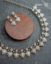 Elevate your collection with this exquisite Mewad Silver Neckpiece &amp; Earrings Set, meticulously crafted from premium 92.5 sterling silver. Each piece showcases intricate detailing while remaining remarkably lightweight. The coordinated set offers versatile styling options, seamlessly transitioning from everyday elegance to special occasions. Whether you're curating your personal wardrobe or seeking a thoughtful gift for someone discerning