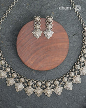 Elevate your collection with this exquisite Mewad Silver Neckpiece &amp; Earrings Set, meticulously crafted from premium 92.5 sterling silver. Each piece showcases intricate detailing while remaining remarkably lightweight. The coordinated set offers versatile styling options, seamlessly transitioning from everyday elegance to special occasions. Whether you're curating your personal wardrobe or seeking a thoughtful gift for someone discerning