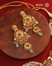 Traditional Jewellery perfect for family weddings.
Beautiful antique finish neckpiece set intricately embedded in the& lustre of precious coloured stones and pearls. A stunning addition to your wedding look. The beautiful workmanship is something that can be cherished and passed on for generations to come.