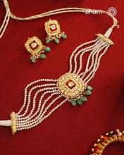 Adorn yourself with this breathtaking Kundan Gold Polish Silver Choker Set. Crafted from 92.5 sterling silver with stunning kundan detailing, the set features cultured pearls for a beautiful, royal feel. Style with any traditional outfit for an elegant look.