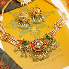 This beautiful Kundan Gold Polish Choker Set is a statement-making piece perfect for special occasions. Featuring stunning intricate Kundan work with delicate detailing of pearls and semi-precious stones, this choker is an elegant and glamorous addition to any ensemble.