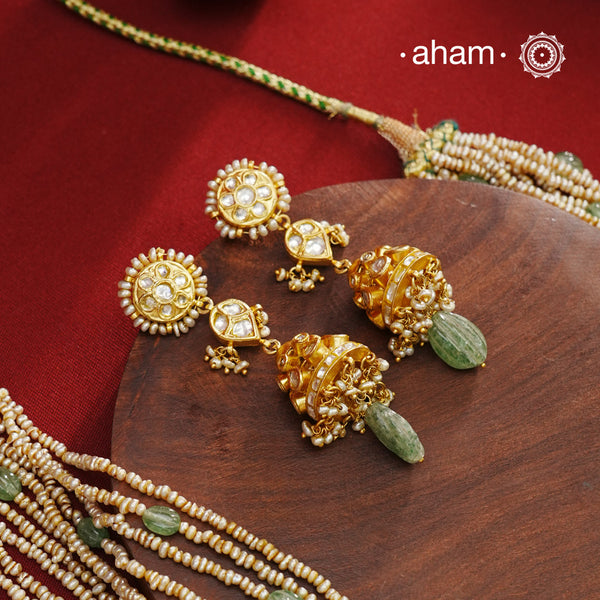 Elegant gold polish earringsembellished. Handcrafted in 92.5 sterling silver. Perfect for special occasions and festivities.