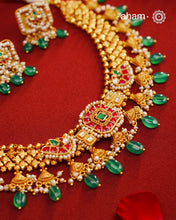 This Kundan Pearl Gold Polish Silver Neckpiece  Earrings Set from our Heritage collection showcases intricate traditional designs, meticulously crafted in 92.5 silver with a stunning gold polish and exquisite kundan work. Perfect for modern brides seeking a touch of timeless elegance.