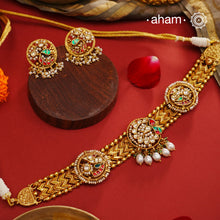 Elegant Silver gold polish choker set embellished with kundan and cultured pearls. Handcrafted using traditional jadua kundan techniques in 92.5 sterling silver. Perfect for intimate weddings and upcoming festive celebrations.