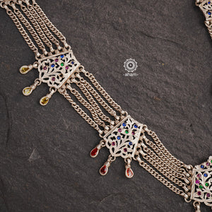 Experience the cultural elegance with our Vintage Tribal Silver Neckpiece. Adorned with intricate chilai work, it boasts a stunning vintage design. Made for those who appreciate traditional craftsmanship, this neckpiece adds a touch of sophisticated charm to any outfit. Embrace the heritage and elevate your style.