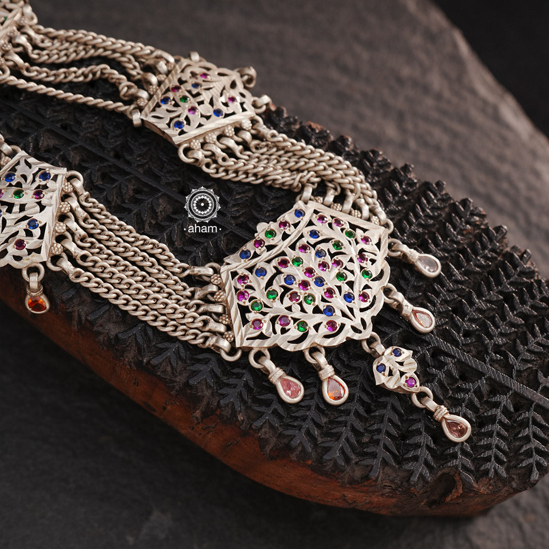 Experience the cultural elegance with our Vintage Tribal Silver Neckpiece. Adorned with intricate chilai work, it boasts a stunning vintage design. Made for those who appreciate traditional craftsmanship, this neckpiece adds a touch of sophisticated charm to any outfit. Embrace the heritage and elevate your style.