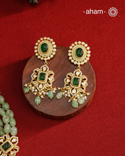 Experience the brilliance of the Moissanite Gold Polish Silver Neckpiece &amp; Earrings Set, expertly crafted in 92.5% silver with a refined gold polish. This set features moissanite stones that closely mimic the sparkle of real diamonds, elegantly strung on green beads for a sophisticated look. Perfect for adding timeless elegance to any ensemble, it combines classic design with exquisite craftsmanship.