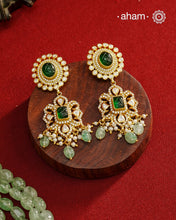 Experience the brilliance of the Moissanite Gold Polish Silver Neckpiece &amp; Earrings Set, expertly crafted in 92.5% silver with a refined gold polish. This set features moissanite stones that closely mimic the sparkle of real diamonds, elegantly strung on green beads for a sophisticated look. Perfect for adding timeless elegance to any ensemble, it combines classic design with exquisite craftsmanship.