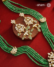 Experience the brilliance of the Moissanite Gold Polish Silver Neckpiece &amp; Earrings Set, expertly crafted in 92.5% silver with a refined gold polish. This set features moissanite stones that closely mimic the sparkle of real diamonds, elegantly strung on green beads for a sophisticated look. Perfect for adding timeless elegance to any ensemble, it combines classic design with exquisite craftsmanship.