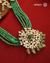 Experience the brilliance of the Moissanite Gold Polish Silver Neckpiece &amp; Earrings Set, expertly crafted in 92.5% silver with a refined gold polish. This set features moissanite stones that closely mimic the sparkle of real diamonds, elegantly strung on green beads for a sophisticated look. Perfect for adding timeless elegance to any ensemble, it combines classic design with exquisite craftsmanship.