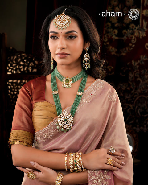 Experience the brilliance of the Moissanite Gold Polish Silver Neckpiece & Earrings Set, expertly crafted in 92.5% silver with a refined gold polish. This set features moissanite stones that closely mimic the sparkle of real diamonds, elegantly strung on green beads for a sophisticated look. Perfect for adding timeless elegance to any ensemble, it combines classic design with exquisite craftsmanship.