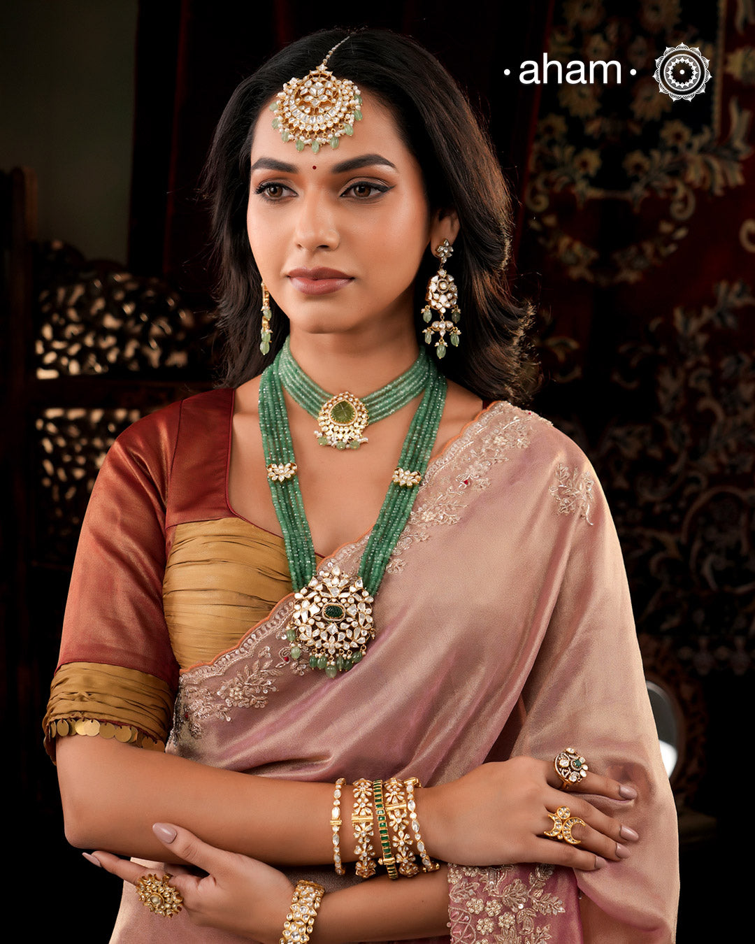 Experience the brilliance of the Moissanite Gold Polish Silver Neckpiece & Earrings Set, expertly crafted in 92.5% silver with a refined gold polish. This set features moissanite stones that closely mimic the sparkle of real diamonds, elegantly strung on green beads for a sophisticated look. Perfect for adding timeless elegance to any ensemble, it combines classic design with exquisite craftsmanship.