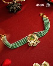 Experience the brilliance of the Moissanite Gold Polish Silver Neckpiece &amp; Earrings Set, expertly crafted in 92.5% silver with a refined gold polish. This set features moissanite stones that closely mimic the sparkle of real diamonds, elegantly strung on green beads for a sophisticated look. Perfect for adding timeless elegance to any ensemble, it combines classic design with exquisite craftsmanship.