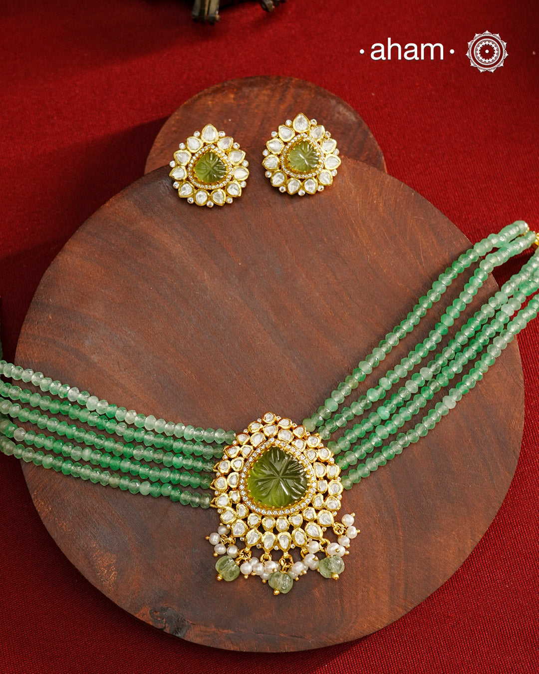 Experience the brilliance of the Moissanite Gold Polish Silver Neckpiece & Earrings Set, expertly crafted in 92.5% silver with a refined gold polish. This set features moissanite stones that closely mimic the sparkle of real diamonds, elegantly strung on green beads for a sophisticated look. Perfect for adding timeless elegance to any ensemble, it combines classic design with exquisite craftsmanship.