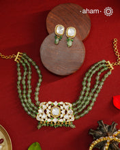 Experience the brilliance of the Moissanite Gold Polish Silver Neckpiece &amp; Earrings Set, expertly crafted in 92.5% silver with a refined gold polish. This set features moissanite stones that closely mimic the sparkle of real diamonds, elegantly strung on natural green aventurine stones for a sophisticated look. Perfect for adding timeless elegance to any ensemble, it combines classic design with exquisite craftsmanship.