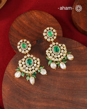 Experience the brilliance of the Moissanite Gold Polish Silver Neckpiece &amp; Earrings Set, expertly crafted in 92.5% silver with a refined gold polish. This set features moissanite stones that closely mimic the sparkle of real diamonds, elegantly strung on green beads for a sophisticated look. Perfect for adding timeless elegance to any ensemble, it combines classic design with exquisite craftsmanship.