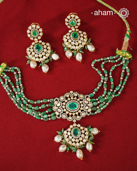 Experience the brilliance of the Moissanite Gold Polish Silver Neckpiece & Earrings Set, expertly crafted in 92.5% silver with a refined gold polish. This set features moissanite stones that closely mimic the sparkle of real diamonds, elegantly strung on green beads for a sophisticated look. Perfect for adding timeless elegance to any ensemble, it combines classic design with exquisite craftsmanship.