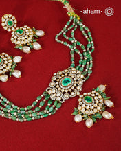 Experience the brilliance of the Moissanite Gold Polish Silver Neckpiece &amp; Earrings Set, expertly crafted in 92.5% silver with a refined gold polish. This set features moissanite stones that closely mimic the sparkle of real diamonds, elegantly strung on green beads for a sophisticated look. Perfect for adding timeless elegance to any ensemble, it combines classic design with exquisite craftsmanship.