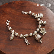 Up your wrist game with the A.M P.M Silver bracelet!
6 beautiful distinct charms all crafted in 92.5 silver come together to make this piece .Whether worn at day or night, this bracelet is Perfect for adding a playful touch to any outfit.