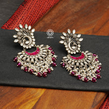 Festive Silver Peacock Earrings with Kundan Work. 