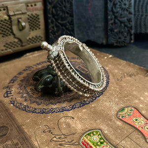 Vintage silver kada with intricate work, handcrafted by skilful artisans. Beautiful piece from a bygone era, that brings back memories and stories of that time.
The price is for one piece only.

