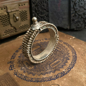 Vintage silver kada with intricate work, handcrafted by skilful artisans. Beautiful piece from a bygone era, that brings back memories and stories of that time.
The price is for one piece only.

