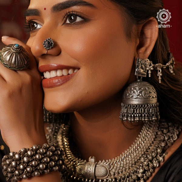 Mewad Statement jhumkie handcrafted in 92.5 sterling silver and comes with a vinatge earchain. This oversized earring is a bound to make a statement and is not for the faint hearted