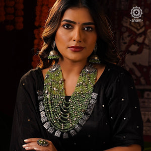 This stunning Ira Silver Neckpiece boasts gorgeous green stones and is meticulously crafted from 92.5 sterling silver. Perfect to make a statement, it pairs seamlessly with both traditional and western attire.