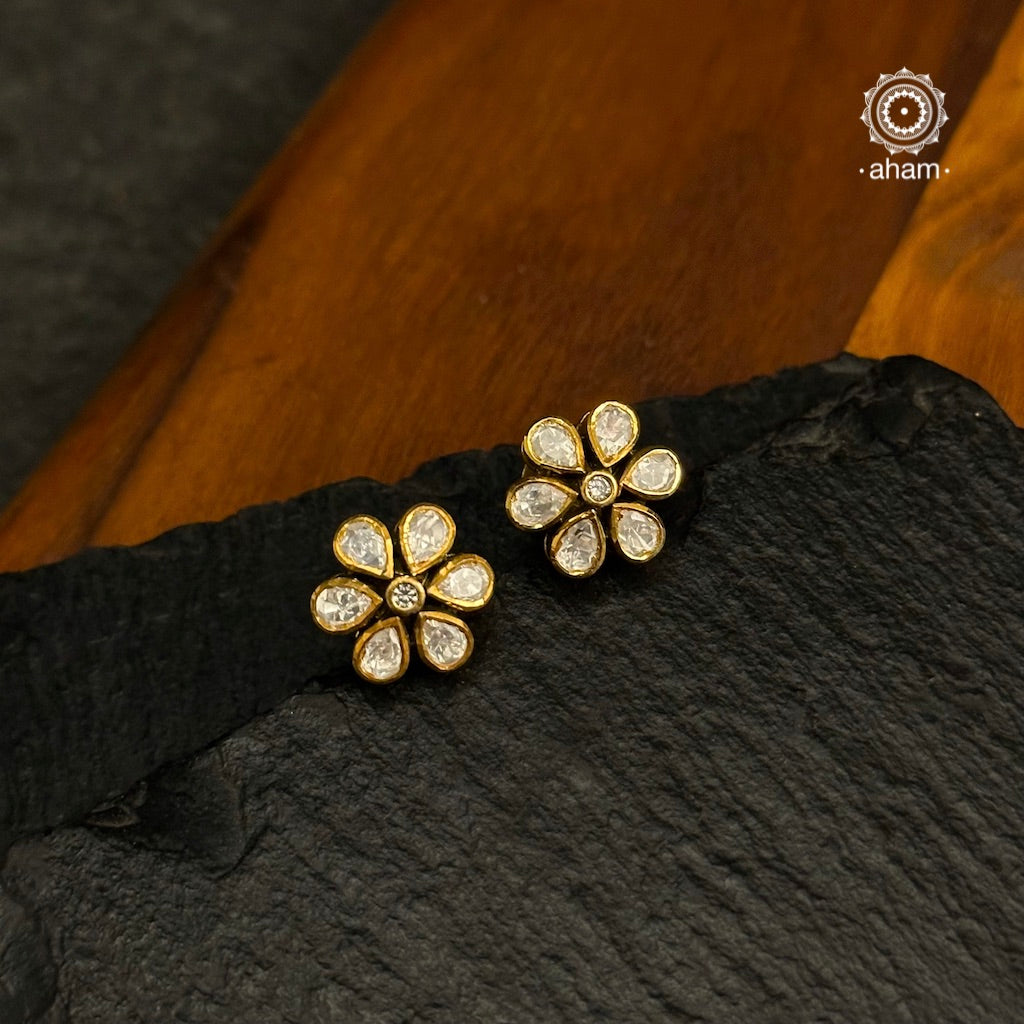 Beautiful crafted Studs in 92.5 silver silver with gold polish and moissanite stone setting