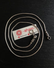 Plain Silver chain
opens at one end for ease of putting in the pendant.