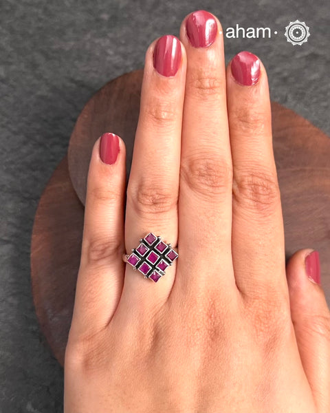 Summer Love Flower Silver Ring in 92.5 sterling silver with maroon Stone setting. A versatile ring that works great with your Indian outfits.&nbsp;