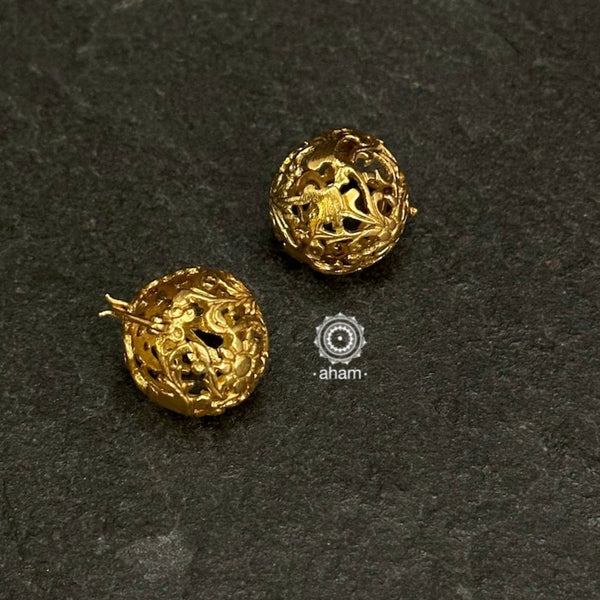 Mewad ball shaped earrings with intricate floral work. Handcrafted in 92.5 sterling silver with gold polish. An ode to the glorious state of Rajasthan. Perfect lightweight, everyday wear earrings.