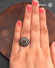 92.5 sterling silver adjustable ring with kemp stone center.