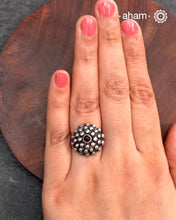 92.5 sterling silver adjustable ring with kemp stone center.