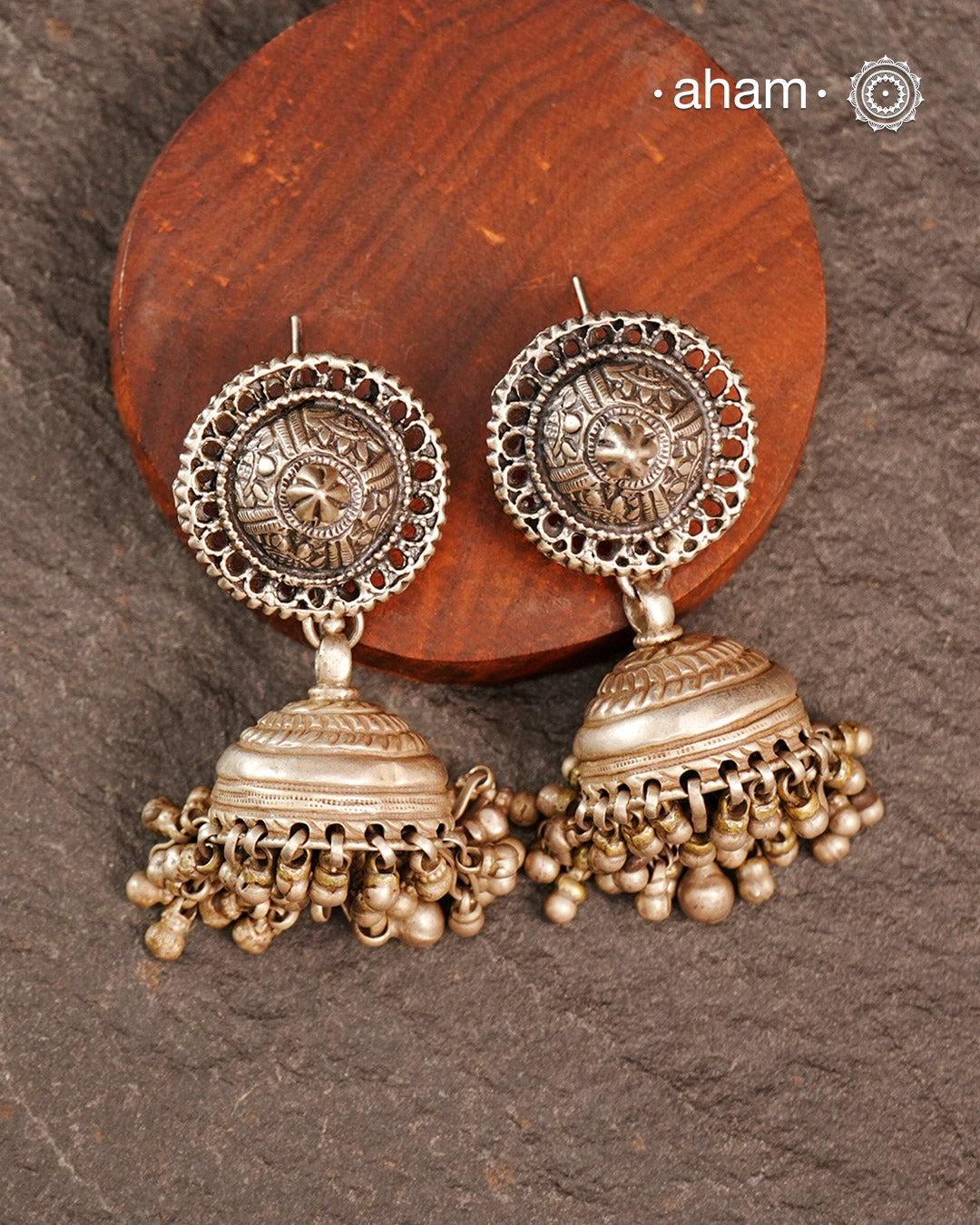 Statement Tribal Silver Jhumkie Earrings - Bold, handcrafted silver jhumkie earrings. The delicate ghungroos create a delightful sound with every movement, adding a playful yet traditional touch. Perfect for those who appreciate heritage jewellery, these earrings are an eye-catching addition to any collection.