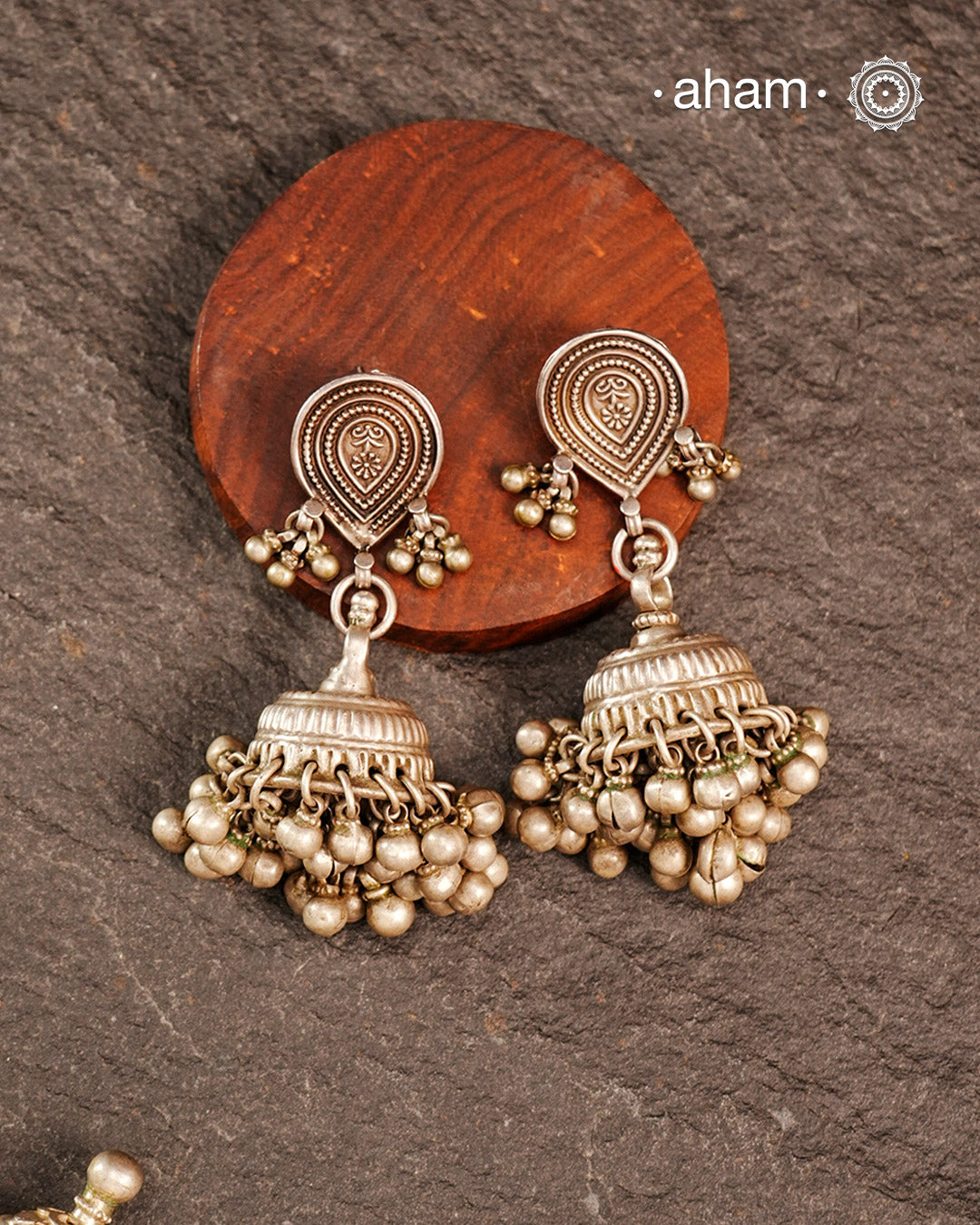 These Tribal Silver Jhumkie earrings showcase expert craftsmanship with finely detailed silver work and beautifully rhythmic ghungroos that add a gentle, melodic charm. Perfect for enhancing traditional attire or adding an ethnic touch to modern outfits, they embody cultural heritage with elegance and sophistication.