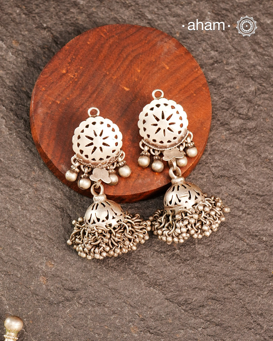 Statement Tribal Silver Jhumkie Earrings - These bold, handcrafted silver jhumkie earrings come with cut work on them and delicate mini jhumkies tied at the bottom.