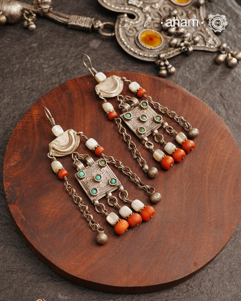 These silver earrings are sourced from the Turkmen central Asia regions. The dents, the marks, the irregularities all add to the charm and tell a story of where they comes from.