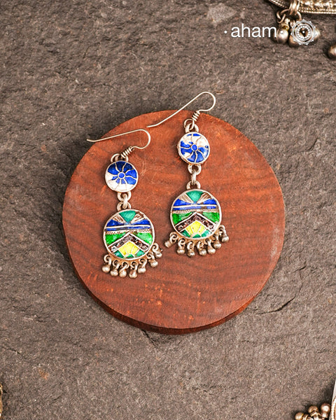 Vintage tribal earrings with hand painted meena work. Please note since these are old pieces, some of the meena worn as worn out.