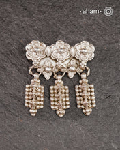 A vintage piece that we found in one of our scouring expeditions. Seems to be a piece of a vintage belt bulk which we have converted into a pendant. A solid, bold, Very unusual piece from a bygone area, that bring back memories and stories of that time. Wear it with a long chain or with a black thread, or layer them to create a distinct look.